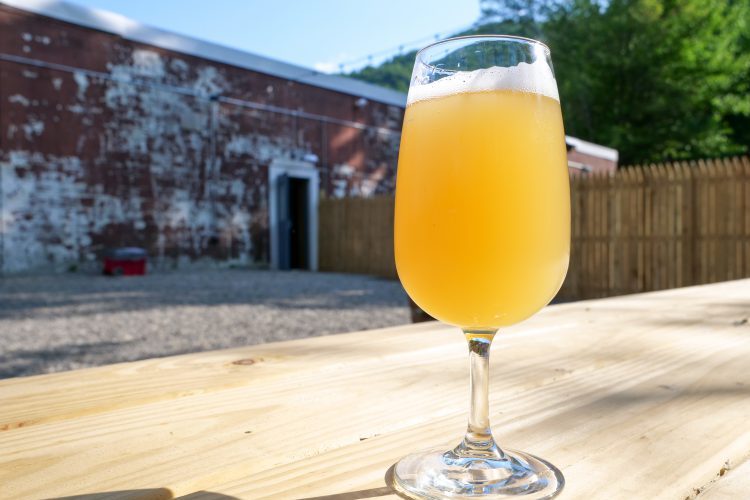 ‘Prasmatic Light’, a refreshing wheat ale with notes of orange peel, peaches and grapefruit. @Rebecca Andre of Mountain Girl Photography, NY. Use by permission only please.